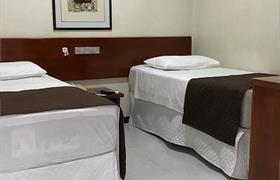 Quarto Twin 2 camas de solteiro Deluxe do Cheverny Apart Hotel