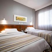 Suíte com camas de solteiro