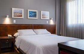 Suíte com cama de casal do Piemonte Hotel