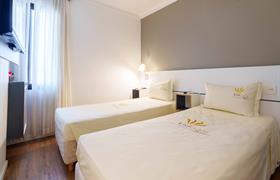 Quarto Quádruplo do Uniclass Hotel Pinheiros