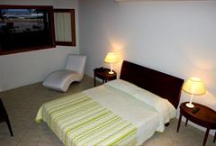 Suite com varanda vista mar