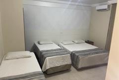 Apartamento Quádruplo - 1 cama de casal + 2 camas 