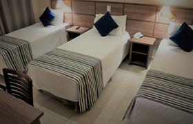 Quarto Standard Triplo Solteiro do Fênix Hotel Pouso Alegre