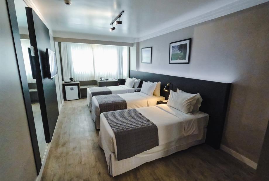 04  triplo 03 camas de solteiro.jpg