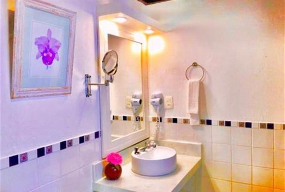 foto banheiro do quarto deluxe.jpeg