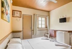 Quarto com Ar Condicionado Econômico