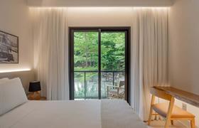 Quarto Luxo Varanda Casal do Pauli Boutique Hotel