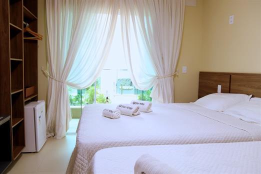 suíte tripla deluxe - varanda.jpeg