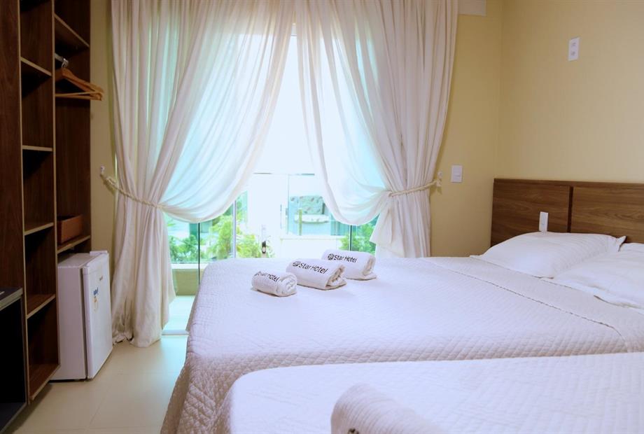 suíte tripla deluxe - varanda.jpeg