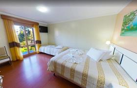 Quarto Triplo Luxo do Zermatt Hotel