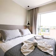 Quarto Duplo Luxo com Sacada