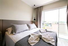 Quarto Duplo Luxo com Sacada