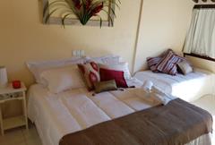 Quarto Deluxe com Cama King-size.