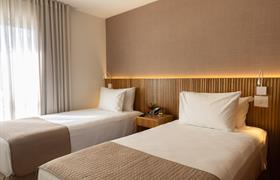 Luxo Twin do Regent Park Suite Hotel