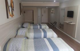 Quarto Triplo Luxo do Seleto Hotel