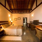 Bangalô com vista para o jardim com uma cama king size