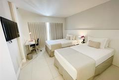 Luxo Premier Triplo com Varanda - Frente Mar