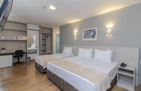 Premium Casal + 01 Solteiro do Coral Trade Hotel