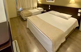 Standard Casal + 01 Solteiro do Coral Trade Hotel