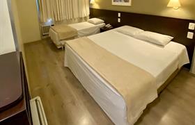 Standard Superior Casal  + 01 Solteiro do Coral Trade Hotel
