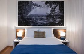 Standard Cama Casal Conjugado do Golden Tower Aeroporto (Lizz) by Fênix Hotéis