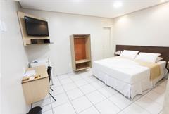 Apartamento Quádruplo Luxo (1 cama casal + 2 solteiros)