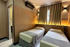 Quarto Econômico com 2 Camas de Solteiro