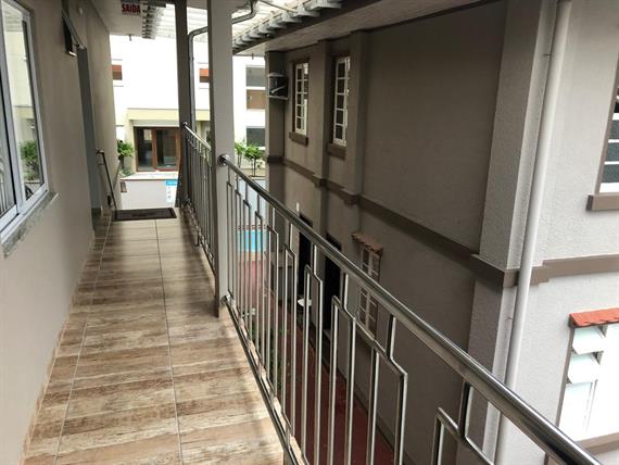 Corredor de acesso a escada suítes standard.jpeg