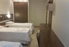 Quarto Executivo Triplo