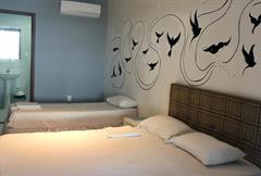 Quarto Triplo Superior com Vista para o Mar