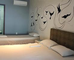 Quarto Triplo Superior com Vista para o Mar