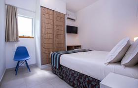 Luxo Lazer Compacto (somente casal) com banheira do Ciribaí Praia Hotel São Sebastião